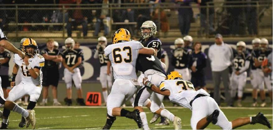 Dibbon Marris • The Madill Record The Madill Wildcat defense stops a runner in its game at Bethany during the 2018 season. This season the Wildcats will be employing a multiple 4-3 defense under the guidance of veteran defensive coordinator Jimmy Dickey, Jr.