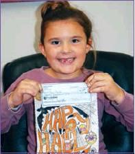 Connie Bardin • The Madill Record Haylin Hartin, seven years old, won second place in the 6-8 years old category.