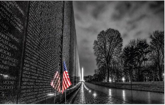 The Vietnam Veterans Memorial Wall in Washington DC stands to honor those who fought and died in the Vietnam War. Gary Henry