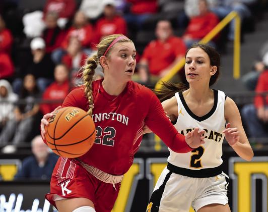 Leah McDaniel tries to steal the ball from Emily Bellitinni during the Madill v Kingston game. Crocket Uber