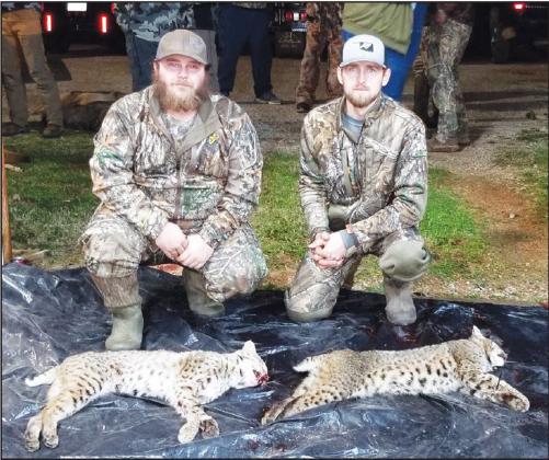 Courtesy photo Third place for the hunt was Jerryk Williams and Cameron Quarrels with two bobcats.