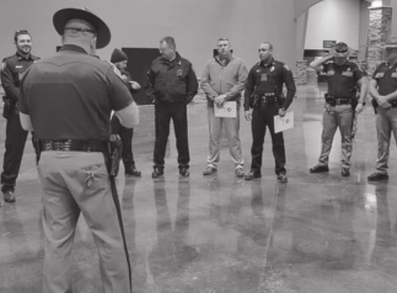 Hampton lines his officers up and gives instruction on what is expected during the Distracted Driving Blitz on January 20,2022.