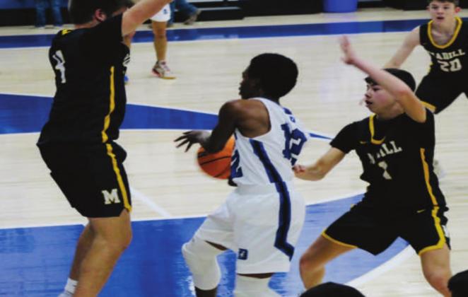 The Madill Wildcats beat the Dickson Comets 36 to 18 on January 7, 2022 after being on a three-week hiatus. Bre Eppler