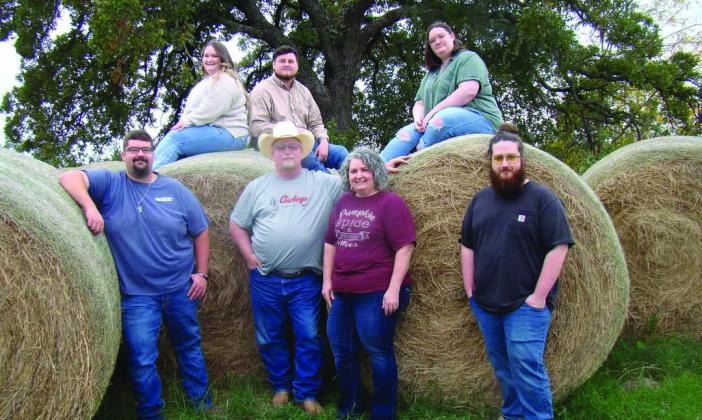 Wes Saxon, pictured above with family, has deep family roots in Marshall County. Courtesy photo