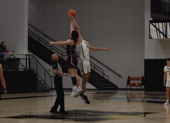 Ethan Wilkerson at tipoff against the Atoka Wampus Cats on January 28. Leslie Mowles • The Madill Record