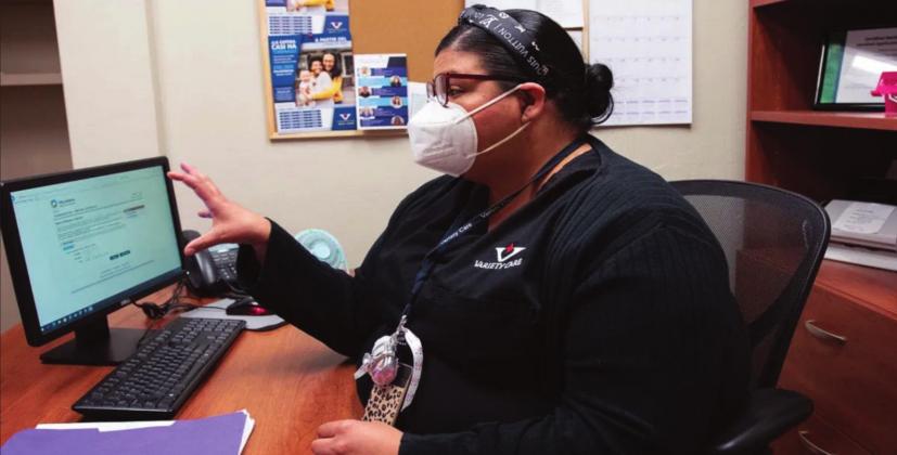 Brenda Wilson is a verifi ed Medicaid application counselor at Variety Care clinic. She helps clients in Anadarko, El Reno and Oklahoma City fi ll out the online application. Wilson said clients are often confused by the wording when trying to fi ll it out themselves and give up, which is why the clinic has counselors to help. Whitney Bryen • Oklahoma Watch he online application. Wilson said