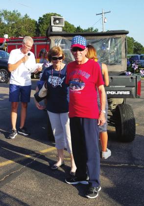 Cotton and Lori Armstrong were the Grand Marshals for the Golf Cart Regatta during the July 4 weekend. Courtesy Photo