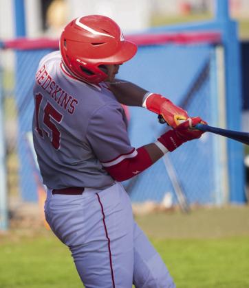 Rhett Coble smashes the ball while at bat. Matt Swearengin