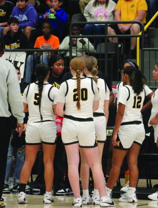 The Lady Wildcats prepare for the game against Kingston. Summer Bryant