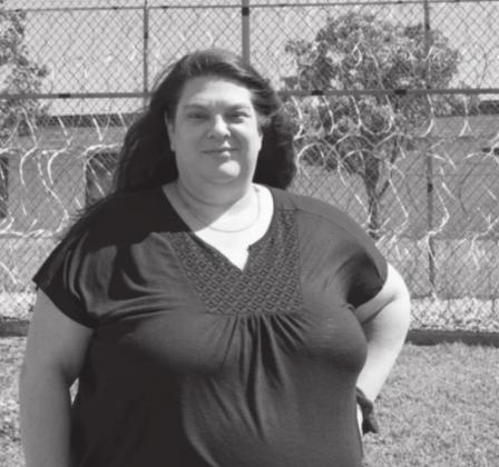 Emily Barnes, 45, stands outside the Lexington Assessment and Reception Center in Lexington. Keaton Ross • Oklahoma Watch