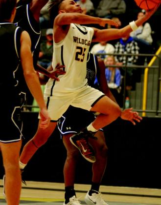 Christian Smith goes for a layup. Summer Bryant