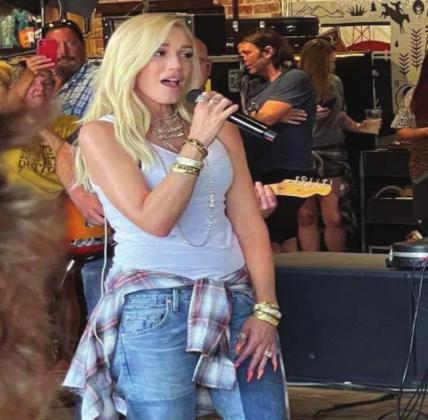 Gwen Stefani wows fans after appearing with Blake Shelton at a rehearsal session at The New Doghouse in Tishomingo. Tom Stewart
