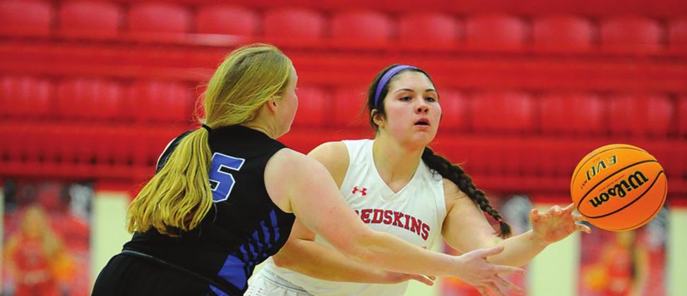 Brittany O’Steen battles against a Dickson Comet during the Lady Redskins v Dickson on February 12, 2021. They won 67 to 43. Crockett Uber