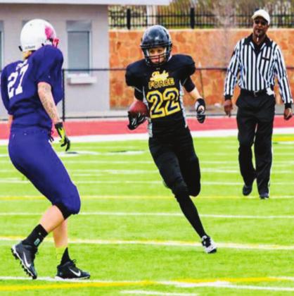 Justine McSwain eludes tacklers during a 2019 gridiron contest. Courtesy photo