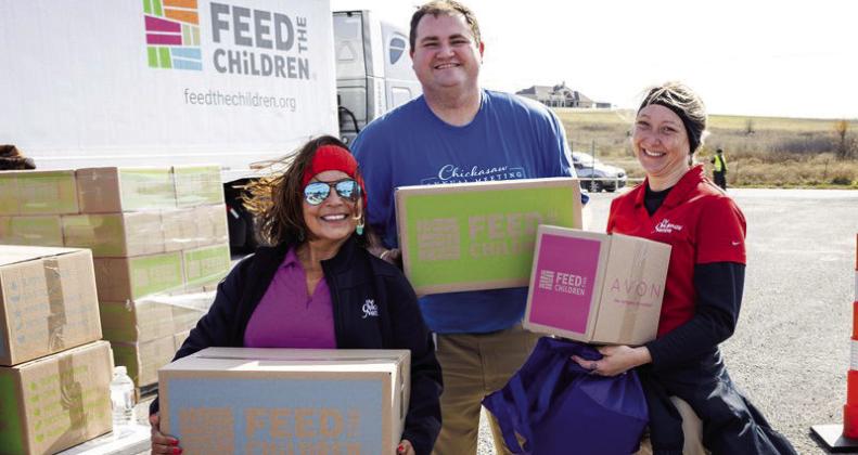 Chickasaw Nation volunteers and staff serve at the No Hunger Holiday event in Madill Dec. 7. From left, Teresa Huff, Jordyn Romine and Tyra Shackleford. Courtesy photo