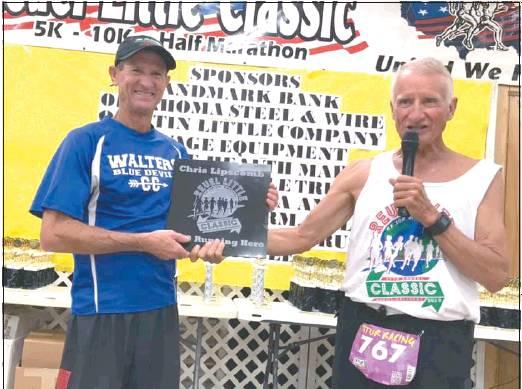 Courtesy Photo This year’s Reuel Little Classic running hero, Chris Lipscomb, is pictured with Dan Little.