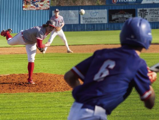 Brady Greene fires a pitch to the batter. Photo by Matt Swearengin