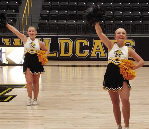 The Wildcat cheerleaders lead the students in a cheer during the first pep rally at the Madill Event Center. Courtesy photo