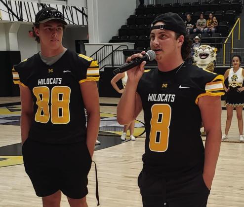Ty Rushing addresses the students while River Shaw looks on during The Wildcats’ first pep rally in the new Madill Event Center on August 26. Courtesy photo