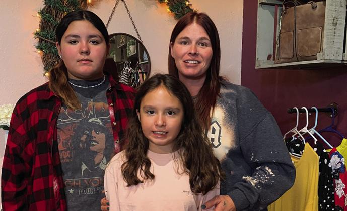 3 Amigas Boutique owner Miranda Russell with daughters Sophia and Arianna Hernandez. Leslie Mowles• The Madill Record