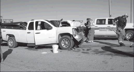 Connie Bardin • The Madill Record A white Chevrolet truck rear ended an eighteen wheeler on US 377 and Hwy 32 on Nov. 12. Nobody was hurt, but it took quite a bit of time to clear the scene because the pickup was hauling a front end loader.