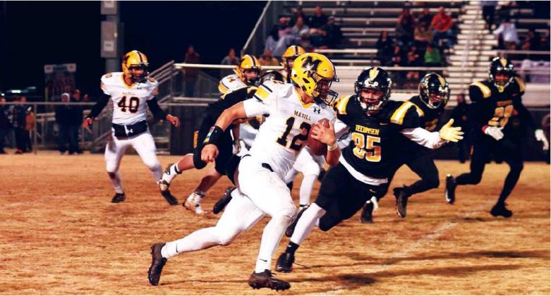 Dibbon Marris • For The Madill Record Madill senior running back Mateo Fajaro carries the ball during Wildcats’ 56-22 loss to the Tecumseh Savages on Nov. 8. The Wildcats finished with a 3-7 overall record for the 2019 season.