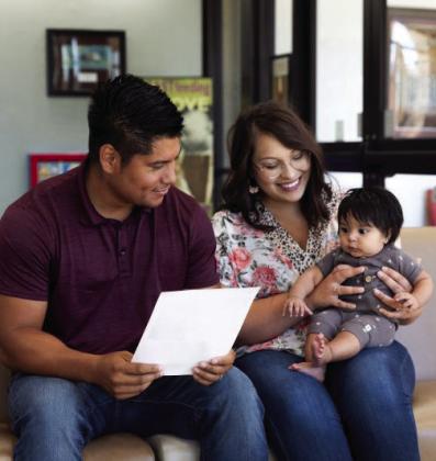 Chickasaw Nation WIC parents, from left, Jordan and Maci Parnacher with their third child Jentzen. Courtesy photo