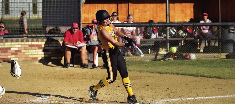 Dahlia Marris hits a line drive during the game. Dibbon Marris