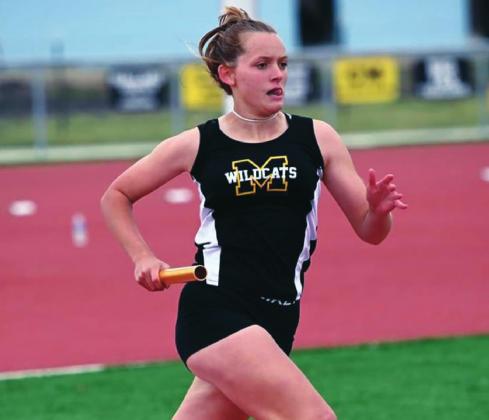 Korlee Cunningham-Martin runs relay in a Madill Track Meet. Don Coffey