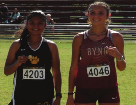 Isabel Sanchez, left, is the Class 4A-Waurika Regional Champion after running a time of 12:17:15 on October 23, 2021. She is heading to the state meet. Courtesy photo