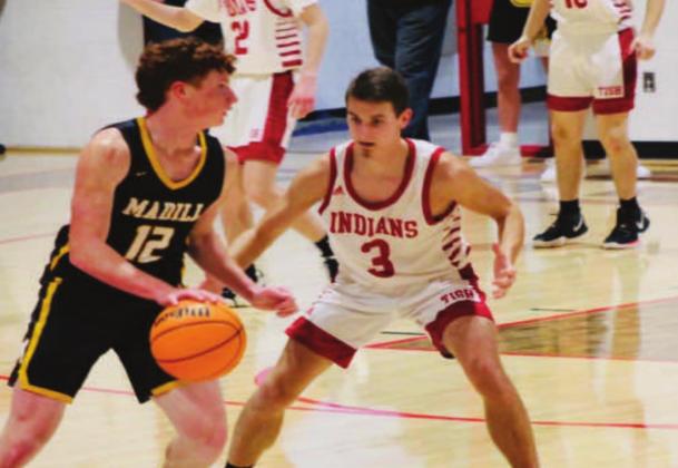 Stephen Sisco dribbles down court during the Madill v Tishomingo game. Bre Eppler