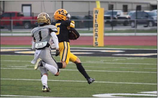 Cade McHatton runs the ball down the field during the Madill vs Broken Bow game. Summer Bryant