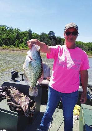 Marie Hadley from Eagletown with a 3.36 pound crappie from Pine Creek. Photo Courtesy of Oklahoma Department of Wildlife Conservation