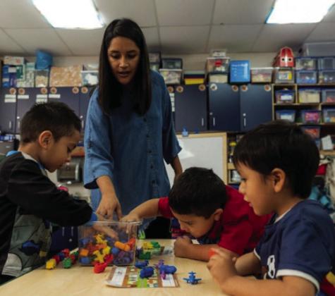 Sarahi Garcia-Acosta, a pre-K teacher at Arthur Elementary School in OKCPS, directs her students as they use math manipulatives to understand important counting concepts. Through the online platform DonorsChoose, OG&amp;amp;E helped fund Garcia-Acosta's request for these critical classroom materials in 2022. Courtesy photo