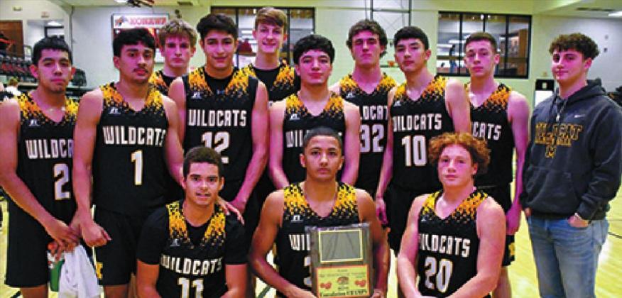Wildcats RJ Morris, Mason Coles, Stephen Sisco, Ezekiel Fuentes, Miguel Duran, Yoyo Robles, Gael Selinas, Javier Gomez, Kendall Robertson, Nick Northcutt, River Shaw, Hayden Harper, and Ty Rushing pose with the plaque after winning the Consolation place in the Konowa Basketball Tournament. Misty Thompson