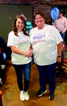 Debbie Croasdale, right, endorsed Kyleigh Wescott, left, for Marshall County Assessor at Croasdale's retirement party. Tom Stewart