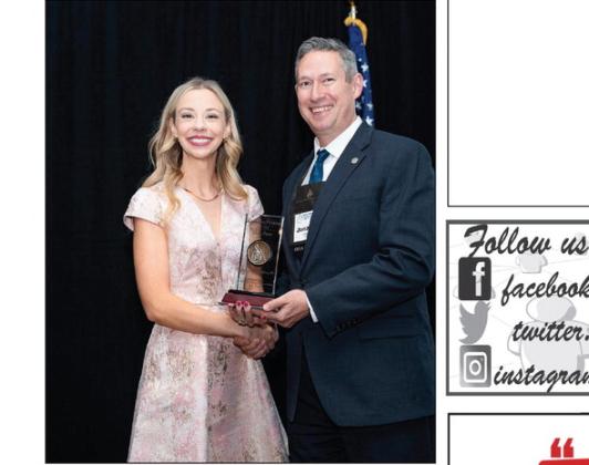 Jacob Young, right, presents Dr. French-Hoffman, left, with the Rookie of the Year award. Courtesy photo