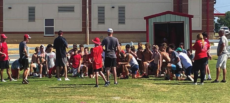 New Head Coach Brad Hill giving a speech to his players. Gary Jackson