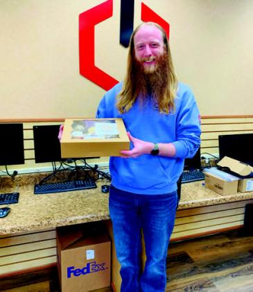 To show customer appreciation,The Madill Record presented CBOTechnolgies(above)andP2Minerals(below)withbaked goods from Sourdoe's Bakery to thank them for being The Madill Record's customers. Leslie Mowles • The Madill Record