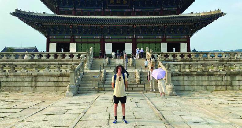 Declan Calfy standing in front of the Gyeongbokgung Palace, Seoul, South Korea. Courtesy photo