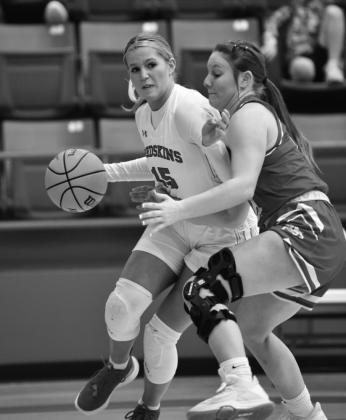 Ethel Stewart fights off an opponent at the Lady Redskins v Sulphur Lady Bulldogs on February 12, 2022. Crocket Uber