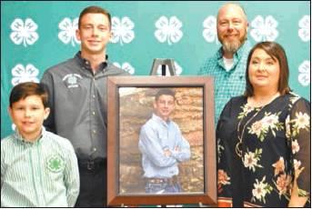 Courtesy Photo Hayden Harper and Kristen Chapa were presented with their portraits as the 2018 Hall of Fame recipients.