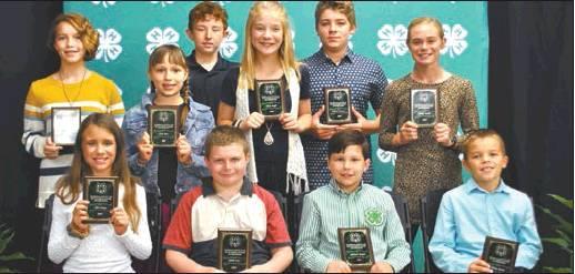 Courtesy Photo The Top Record Books in each age division are included as part of the Green Award Group. This year’s Junior Green Award Group include (back row) Katherine Taylor, Leah Meo, Eli West, Zoey Goff, Chance Whitman, Emily Arnold, (front row) Tillie Chapa, Kaleb Cox, Jackson Harper, and William Taylor.