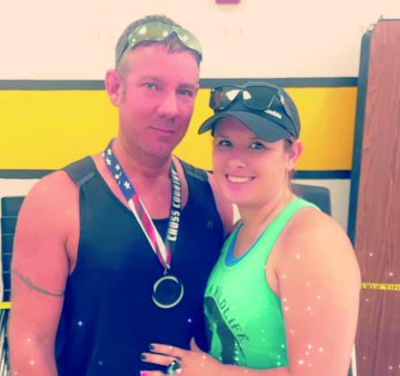 Courtesy photos Pictured left: Jennifer Mercer, left, took first place in the 50-59 age group and Kammie Elmore, right, took 3rd place in the 30-39 age group. Pictured right: Eric, left, took 2nd place in the 40-49 age group poses with Cydnie Moore, right.