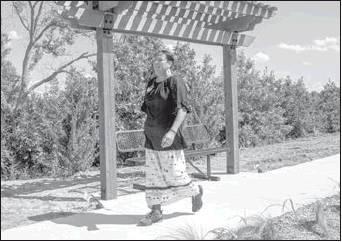 Courtesy Photo Ashley Wallace goes for a quick trek in an effort to maintain her health. She said it is important to her to stay healthy because she intends to be here for her children as long as possible.