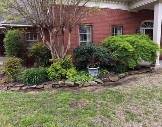 Courtesy photos Margaret and Keith Long were named the April Yard of the Month by the Madill Rose Garden Club.