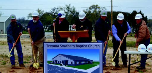 City and church officials use the gold-plated shovels to break ground on the new church being built after the Texoma Southern Baptist Church was destroyed by a tornado. Leslie Mowles • The Madill Record