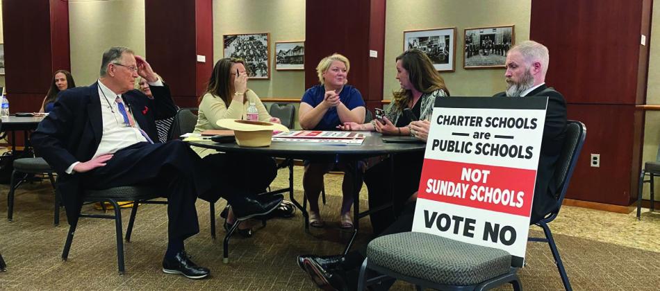 Opponents of an application by a Catholic virtual charter school wait for the start of a meeting by the Statewide Virtual Charter School Board at the Oklahoma History Center in Oklahoma City on Monday, June 5, 2023. Paul Monies • Oklahoma Watch
