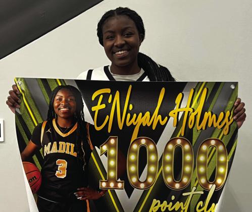 MHS standout, E’niyah Holmes reached a milestone in her school basketball career by joining the 1,000 point club. Courtesy photos