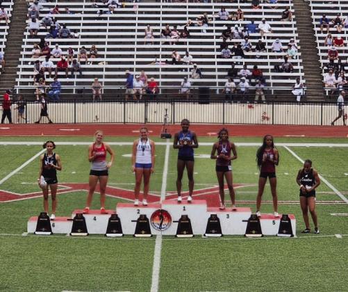 Jadyce Burns (pictured fifth from the left) placed third in the 200-meter dash at OSSAA Track and Field 5A State Championships this year. The former Junior Chickasaw Princess also became an Ada High School record holder in both the 100-meter and 200-meter dash during the 2025 track season. Courtesy photo